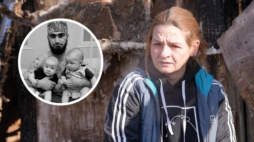 Ольга Крівогуб на руїнах будинку в Богодухові з фото загиблого чоловіка та дітей