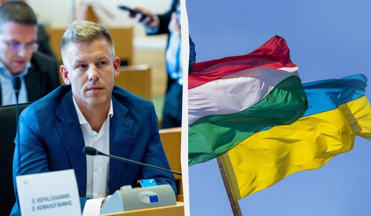 Петер Мадьяр в парламенте Венгрии на фоне флагов Венгрии и Украины