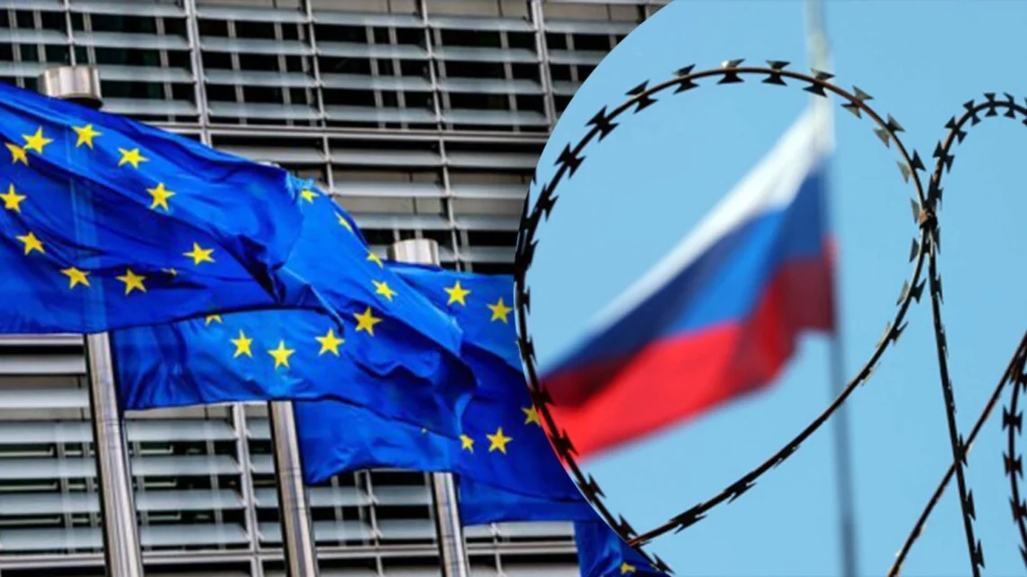 Прапор ЄС та колючий дріт на тлі прапора РФ